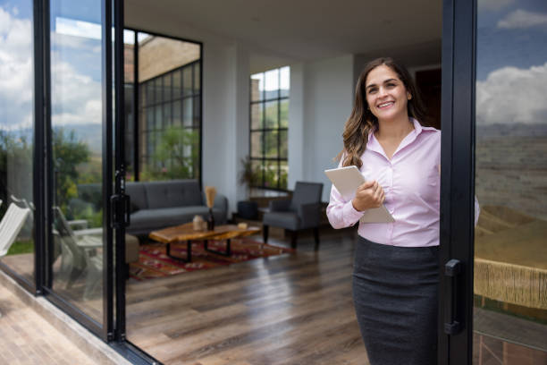 istock Happy real estate agent showing a property 1490765163