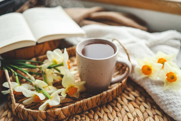 istock Cup of hot tea and spring home interior. good morning concept 1490767412