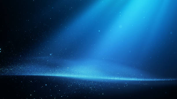 istock Glittering Blue Particles And Light Beams - Abstract Background - Water, Celebration, Technology 1490770094