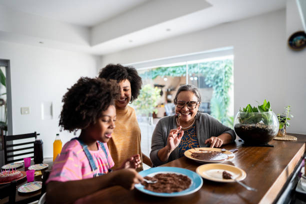 istock Family eating chocolate at home 1490770420