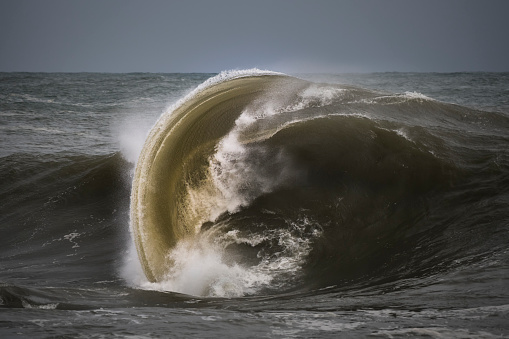 Large breaking wave at sunrise, Australia