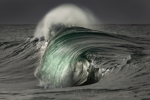 Large breaking wave at sunrise, Australia