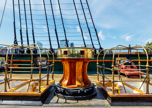 Boston, Massachusetts, USA - May 14, 2023: Deck of the USS Constitution, also known as Old Ironsides. The ship is a three-masted wooden-hulled heavy frigate of the United States Navy. She is the world's oldest ship still afloat. She was launched in 1797, one of six original frigates authorized for construction by the Naval Act of 1794. Constitution is most noted for her actions during the War of 1812 against the United Kingdom, when she captured numerous merchant ships and defeated five smaller British warships. Constitution was retired from active service in 1881 and served as a receiving ship until being designated a museum ship in 1907.