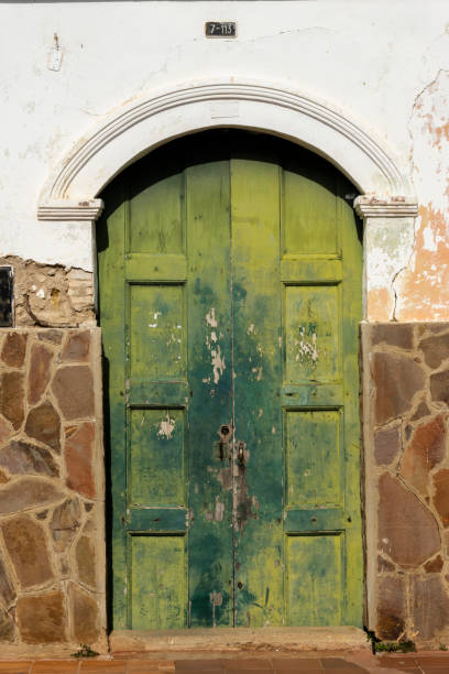 istock Spanish colonial style house wooden door 1490774007