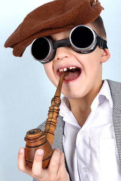 istock Funny Boy with vintage hat, smoker tube 149077443