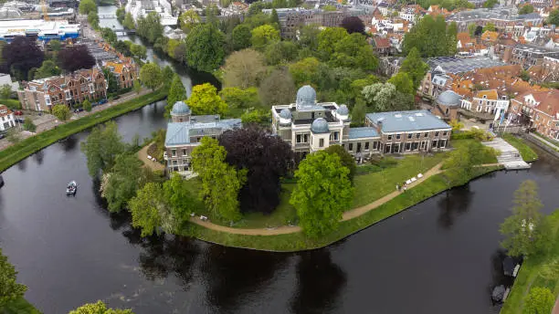 This aerial drone photo shows the city center of Leiden, a beautiful old city in Zuid-Holland, the Netherlands.