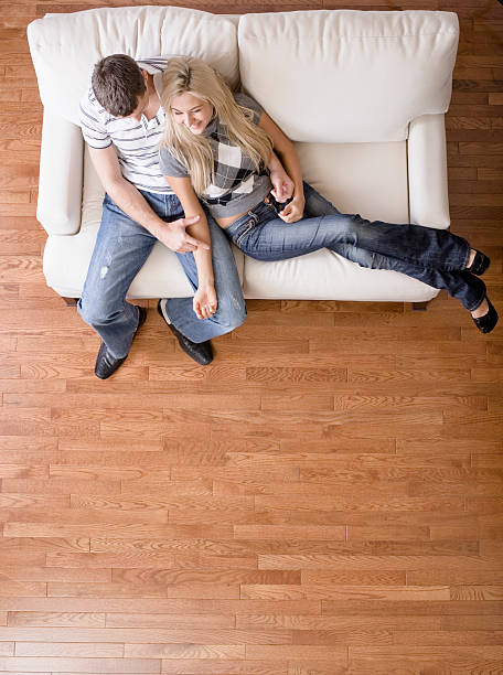 istock Overhead view of a couple on a white love seat 149077799
