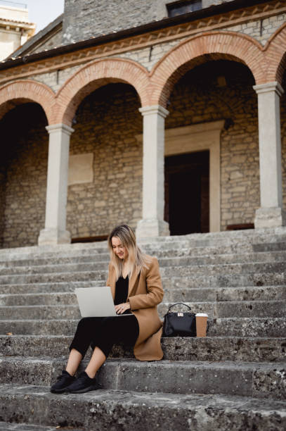 istock female student using laptop computer outdoor in university campus 1490781566