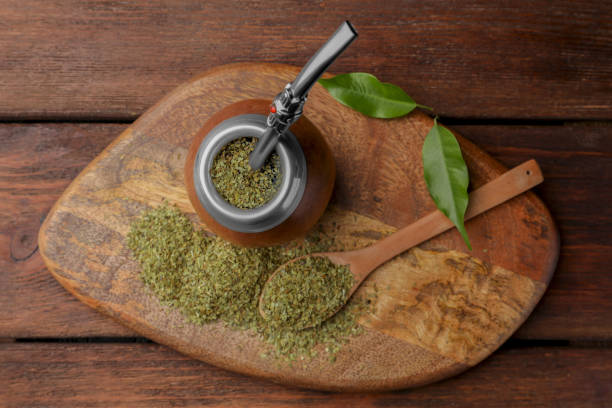 istock Calabash with mate tea and bombilla on wooden table, top view 1490783253