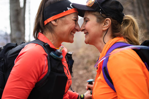 istock Two women hikers happy rubbing noses on a hike 1490783259