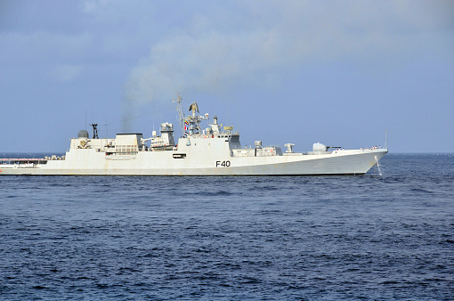 Moroni, Grande Comore / Ngazidja, Comoros islands: starboard view of INS Talwar F40, as it leaves Moroni - Talwar ('sword') Class Frigate - Designed by Severnoye Design Bureau, built at the Baltic Shipyard, Vasilyevsky Island, St Petersburg - Indian Navy Western Fleet warship - Talwar-class guided missile frigates are modified Krivak III-class frigates. Naval patrols in the Indian Ocean apply India's official policy: 'Project influence in India's maritime area of interest, to further the nation's political, economic and security objectives.'