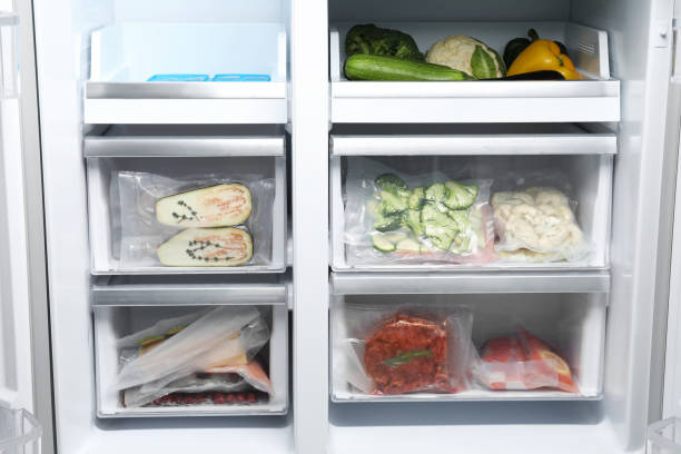 istock Vacuum bags with different products in fridge. Food storage 1490783677