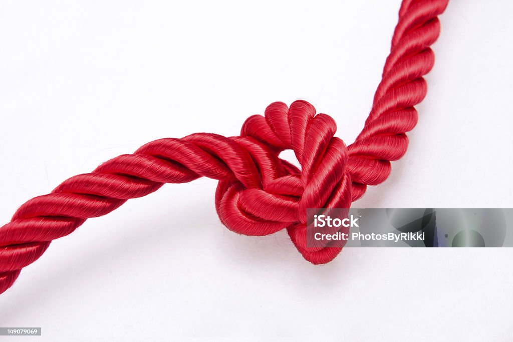 Noeud de soie rouge - Photo de Corde libre de droits