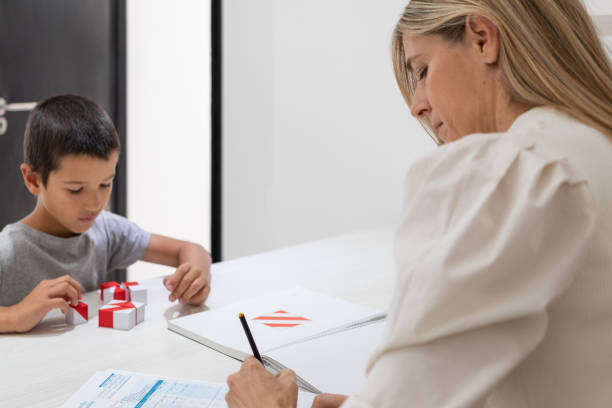 istock Educational psychologist and patient boy 1490791667