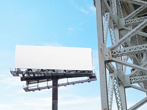Billboard canvas mockup in city background. beautiful weather. Blank billboard for new advertisement.
