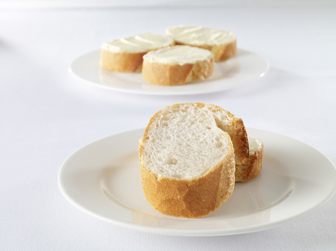 Cream cheese spread on bread slices