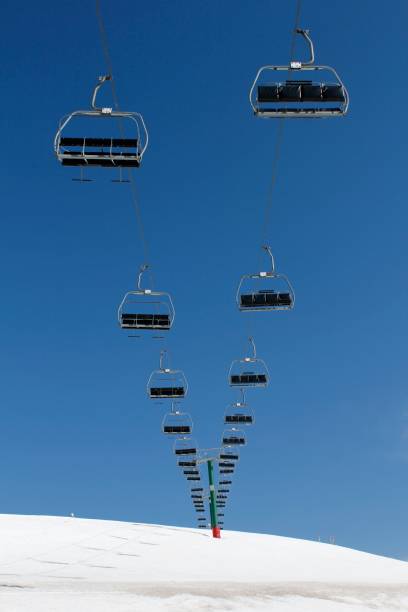 A chair lift on the mountain ski slope at Mount Hotham in Victoria, Australia