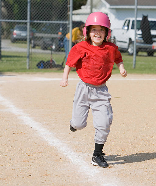 istock Girl running in baseball 149080865