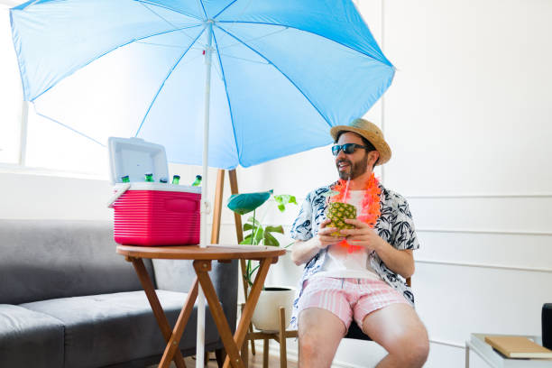 istock Smiling mid adult man having summer staycations 1490808972