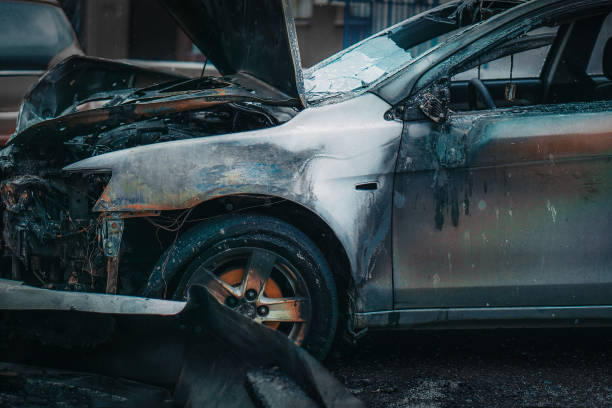 istock Burnt-out damaged car close-up details. 1490810088