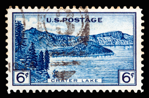 A 1934 issued 6 cent United States postage stamp showing Crater Lake National Park.