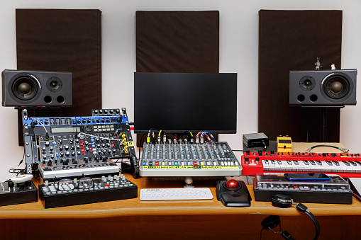 Sound engineer equipment set-up at a music production studio
