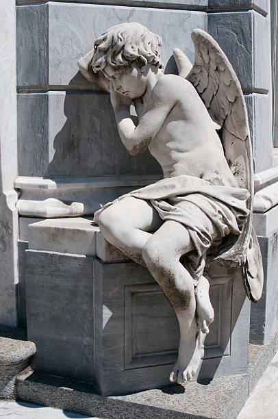istock Angel statue at Recoleta cemetery, Buenos Aires 149081123