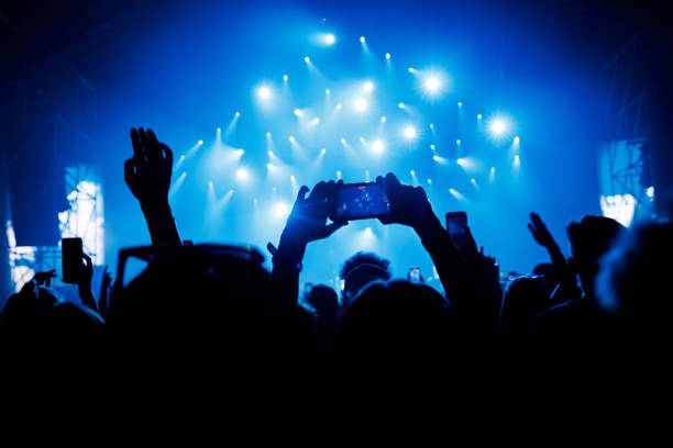 istock Smartphone crowd at a music event 1490811305