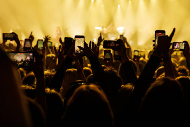 istock Smartphone crowd at a music event 1490811415