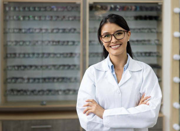 istock Happy ophthalmologist working at an optometry shop 1490813123