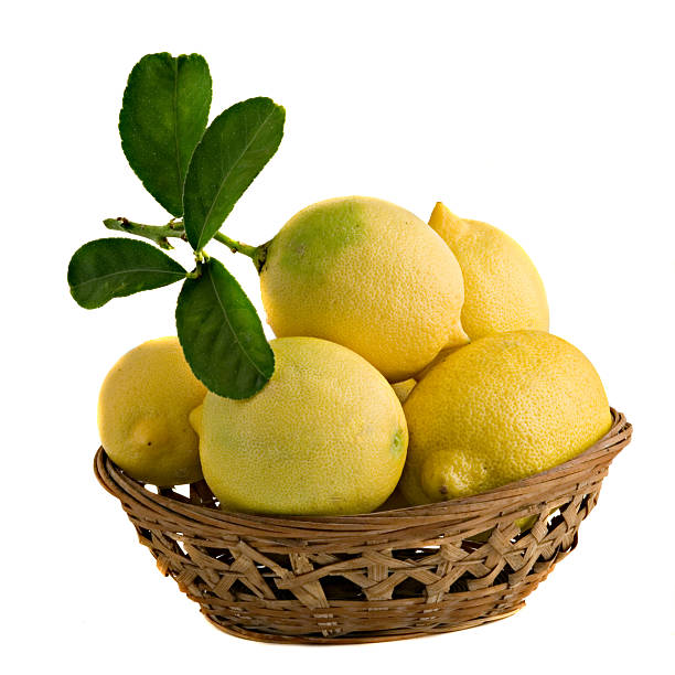 istock Lemons in basket isolated on white background 149081360