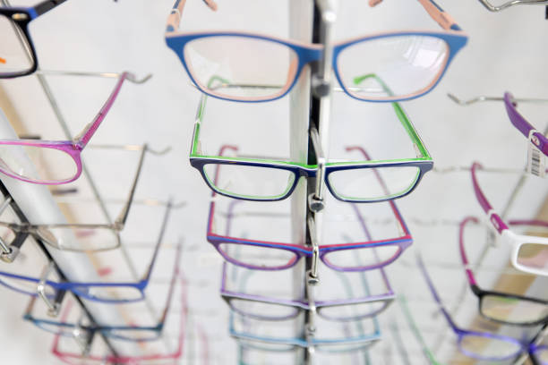 Close-up on colorful eyeglasses on display at an optometry shop - retail concepts