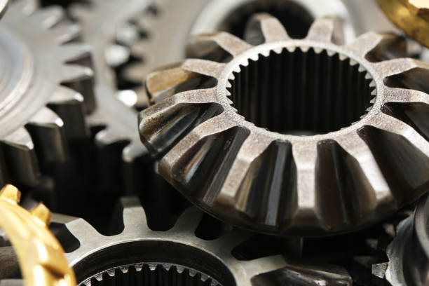 istock Many different stainless steel gears as background, closeup 1490814021