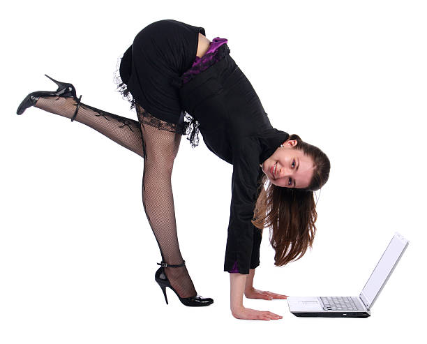 istock Girl in black suit bend forward to notebook 149081524