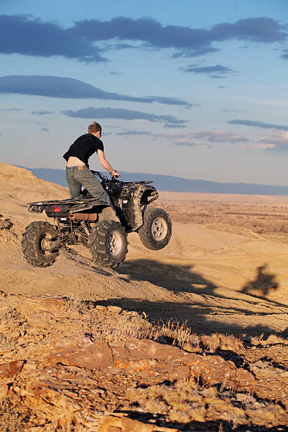 istock Teen jumping on quad ATV 149081821