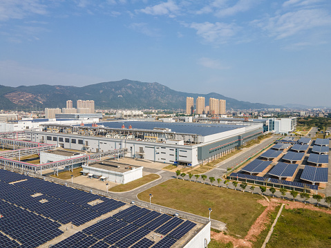 Install solar panels on the top of the factory building