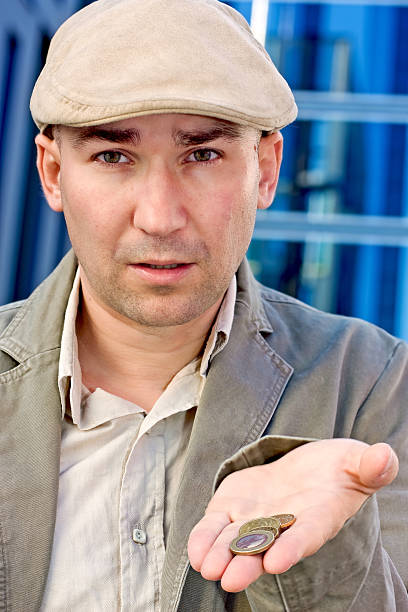 istock man showing his last money 149081840