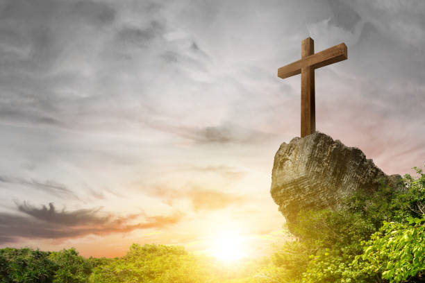 istock Christian Cross on the rock 1490824201
