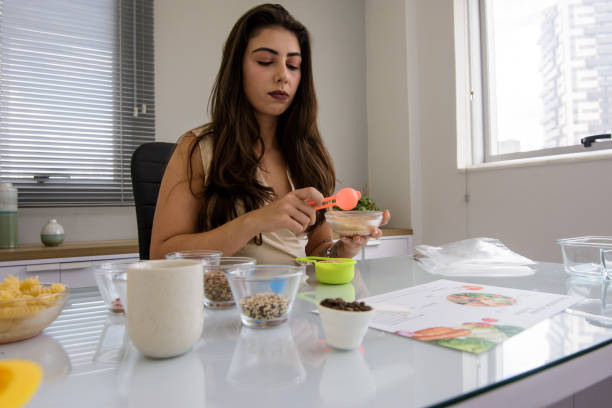 istock Nutritionist sorting grains for a healthy diet 1490825169