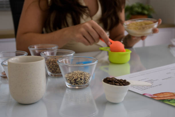 istock Nutritionist sorting grains for a healthy diet 1490825290