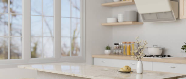 istock Copy space on a beautiful white marble kitchen countertop in minimal white kitchen 1490828598
