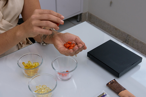 Nutritionist sorting supplements for a healthy diet