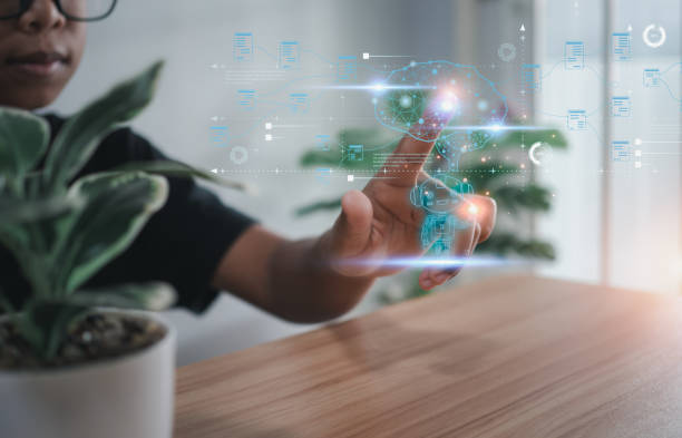 istock Hand touching brain of AI, Symbolic, Machine learning, artificial intelligence of futuristic technology. AI network of brain on business analysis. 1490831128