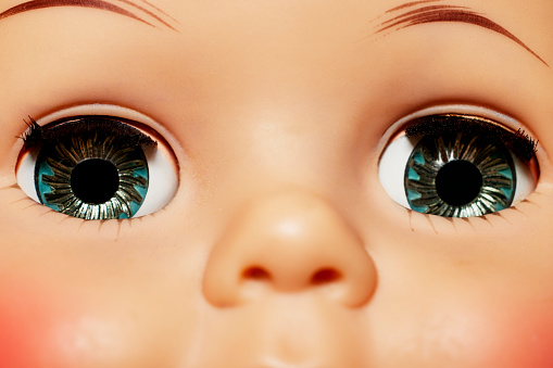 Close up of the Eyes of a Vintage Doll with shallow depth of field