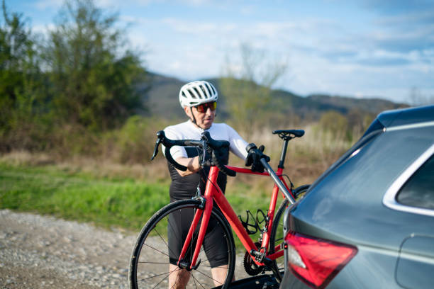 istock Senior man preparing for bike ride in nature. 1490832814