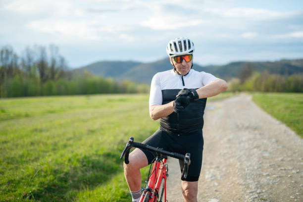 istock Senior man on a bike exercise in nature. 1490832816