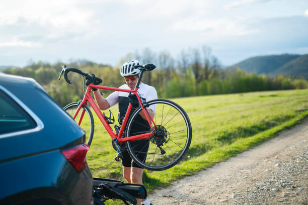 istock Unloading bike from car for a nice bike exercise in nature. 1490832822