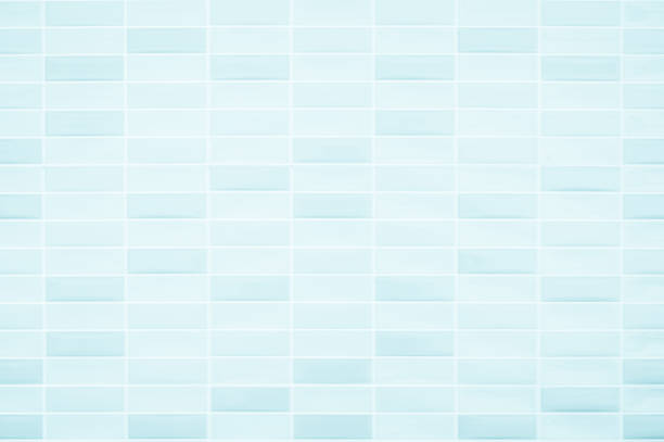 istock Blue light ceramic wall checkered and floor tiles mosaic background in bathroom and kitchen. Design pattern geometric with grid wallpaper texture decoration. Simple seamless abstract surface clean. 1490833484