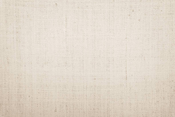 istock Jute hessian sackcloth burlap canvas woven texture background pattern in light beige cream brown color blank. Natural weaving fiber linen and cotton cloth texture as clean empty for decoration. 1490835419