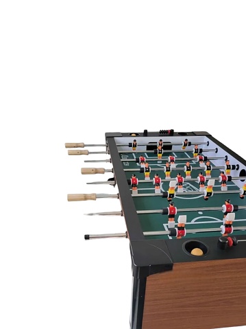Foosball table isolated on white background